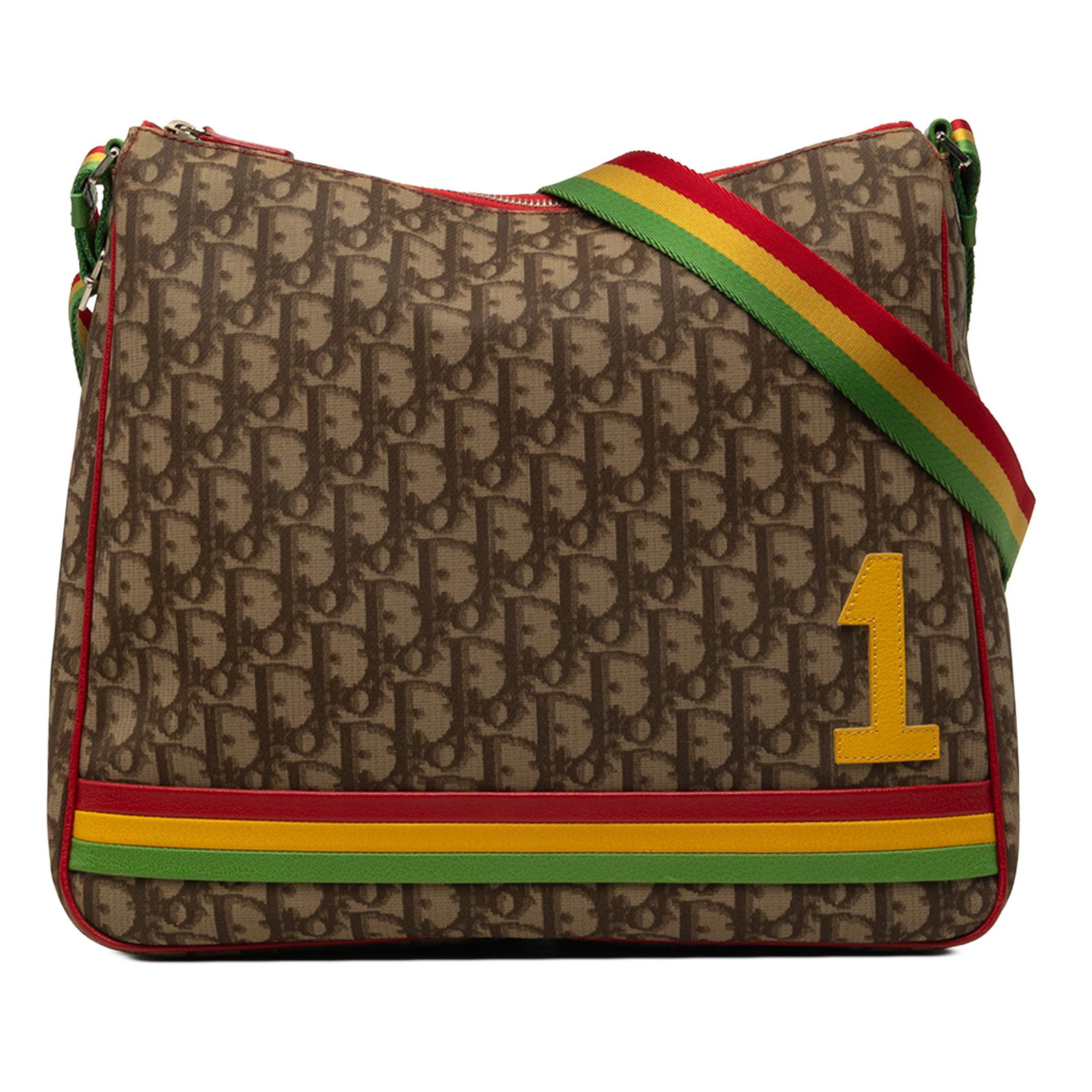 Dior Rasta Oblique Canvas Crossbody Bag Brown: Dior Rasta Oblique Canvas Crossbody Bag Brown Dior Oblique Rasta crossbody bag crafted with a canvas body and leather trim. It features a flat shoulder strap, top zip closure, and an interior zip pock