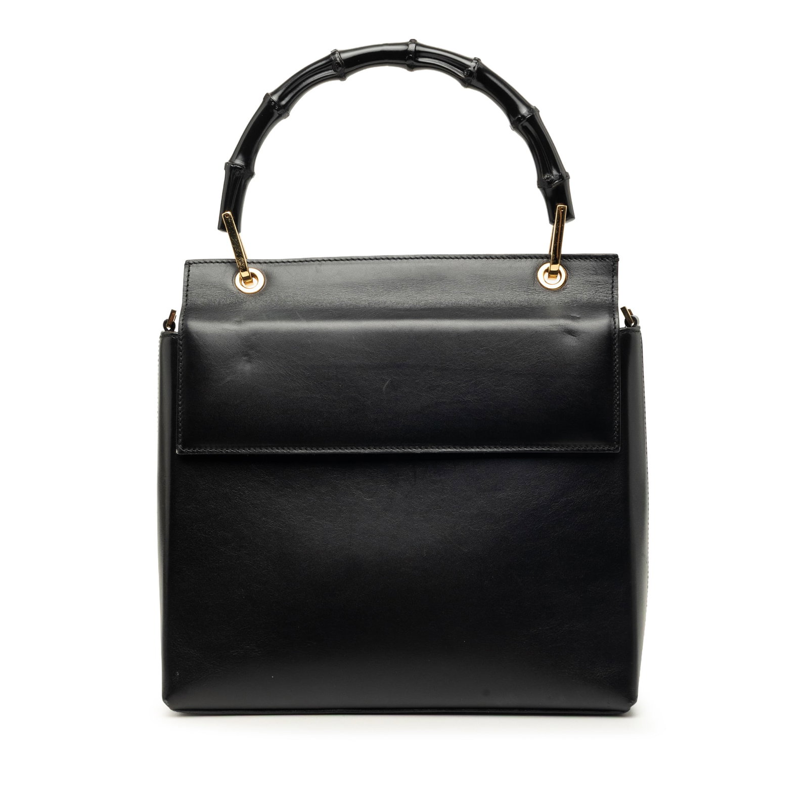 Gucci Calfskin Bamboo Leather Satchel Black Made in Italy: Gucci Calfskin Bamboo Leather Satchel Black Made in Italy Gucci calfskin bamboo satchel in black leather with a bamboo handle and top flap. The interior includes a zip pocket. Condition is B+ with vis