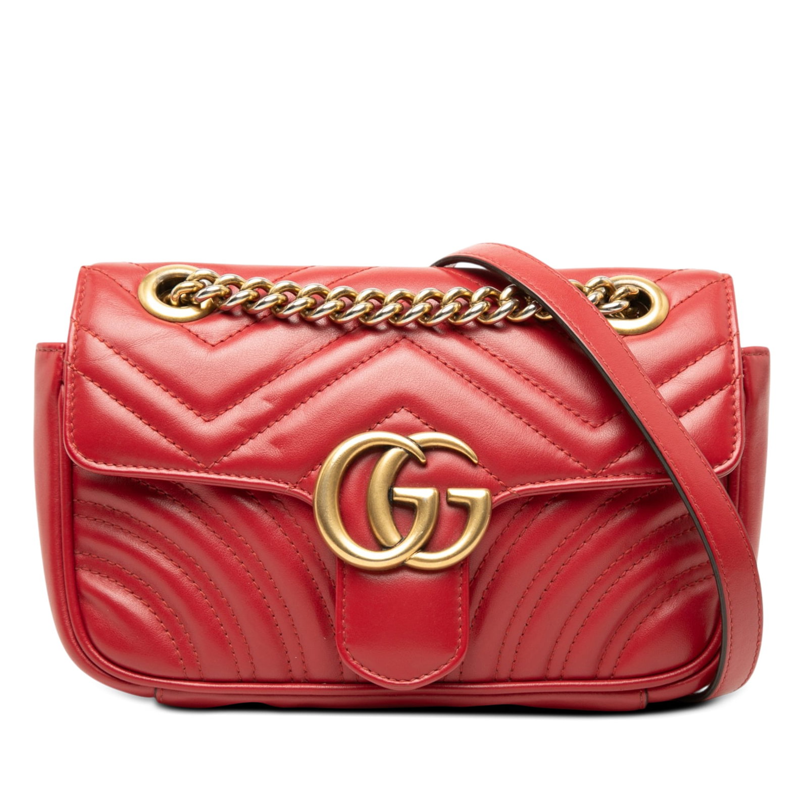Gucci GG Marmont small red leather shoulder bag: Gucci GG Marmont small red leather shoulder bag A small shoulder bag in red quilted calfskin with the GG Marmont matelasse design. It features a curb chain and leather shoulder strap, a front flap wit