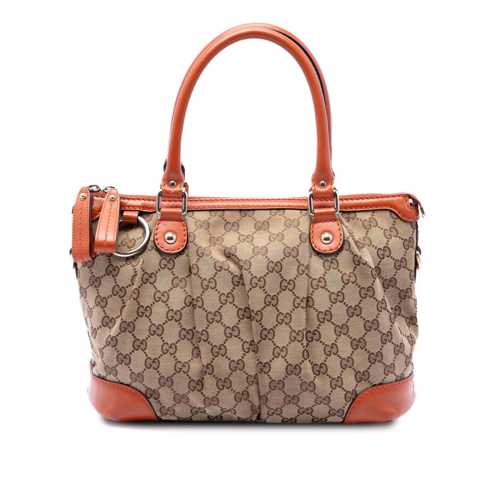Gucci Sukey Satchel Beige GG Canvas Handbag: Gucci Sukey Satchel Beige GG Canvas Handbag Gucci GG Canvas Sukey Satchel crafted with a canvas body and leather trim. This satchel features rolled leather handles, a top zip closure, and an interior 