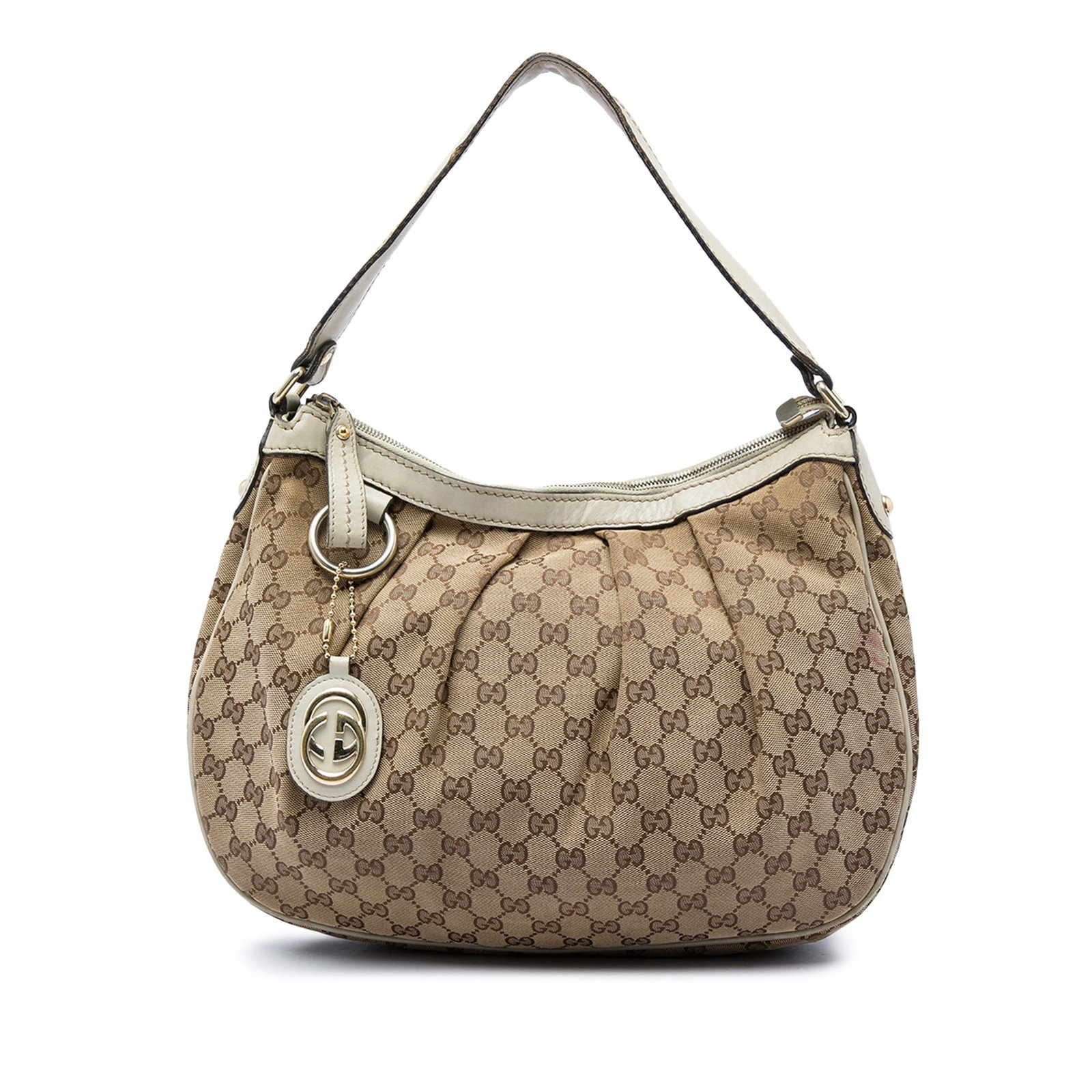 Gucci Sukey Beige GG Canvas Shoulder Bag with Leather Trim: Gucci Sukey Beige GG Canvas Shoulder Bag with Leather Trim Gucci Sukey shoulder bag in beige GG canvas with leather trim. This shoulder bag features a flat leather strap, top zip closure, and an inter