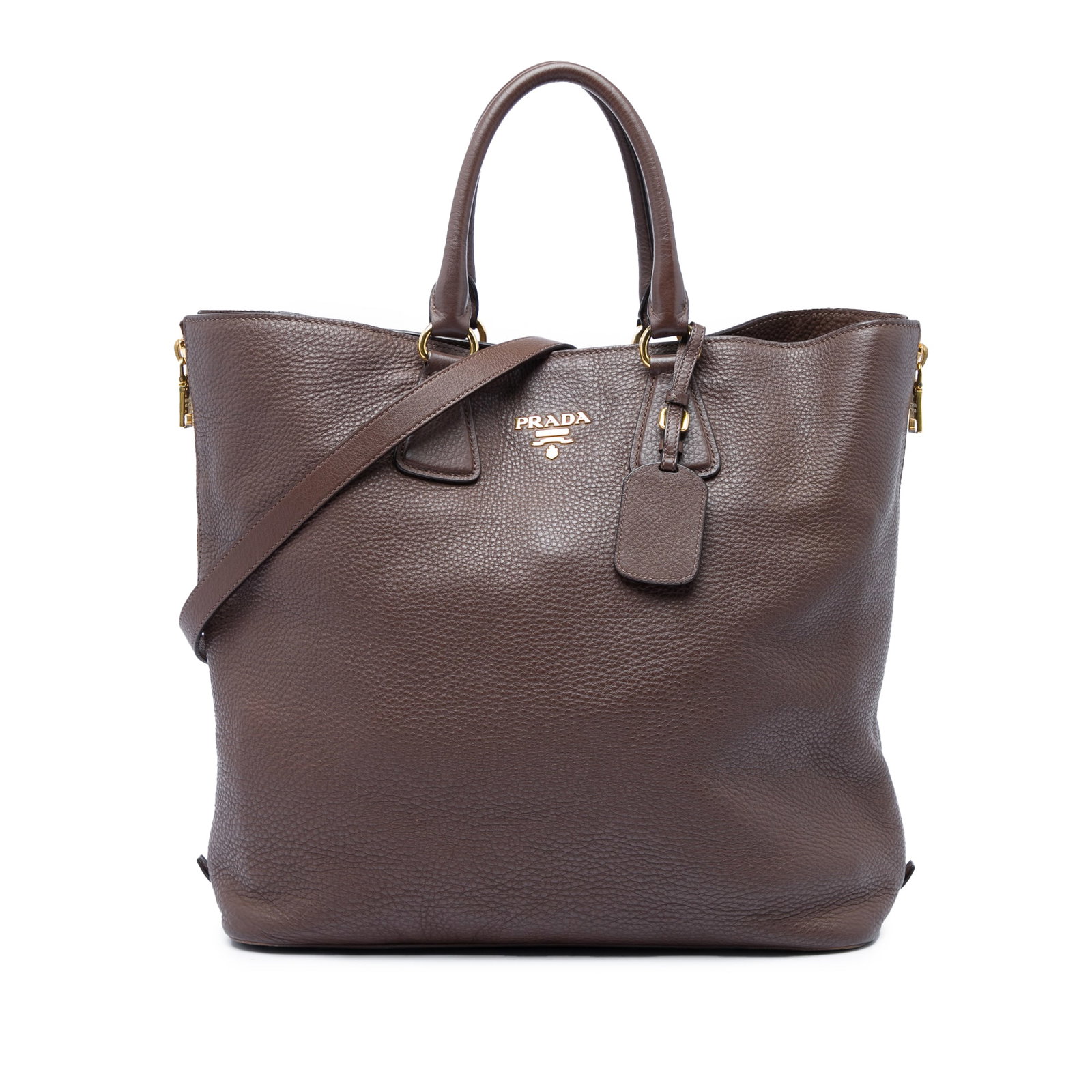 Prada Vitello Daino leather satchel with side zips and shoulder strap: Prada Vitello Daino leather satchel with side zips and shoulder strap A Prada Vitello Daino Side Zip Open Convertible Tote in brown leather with side zip expansions, rolled leather handles, a detachab