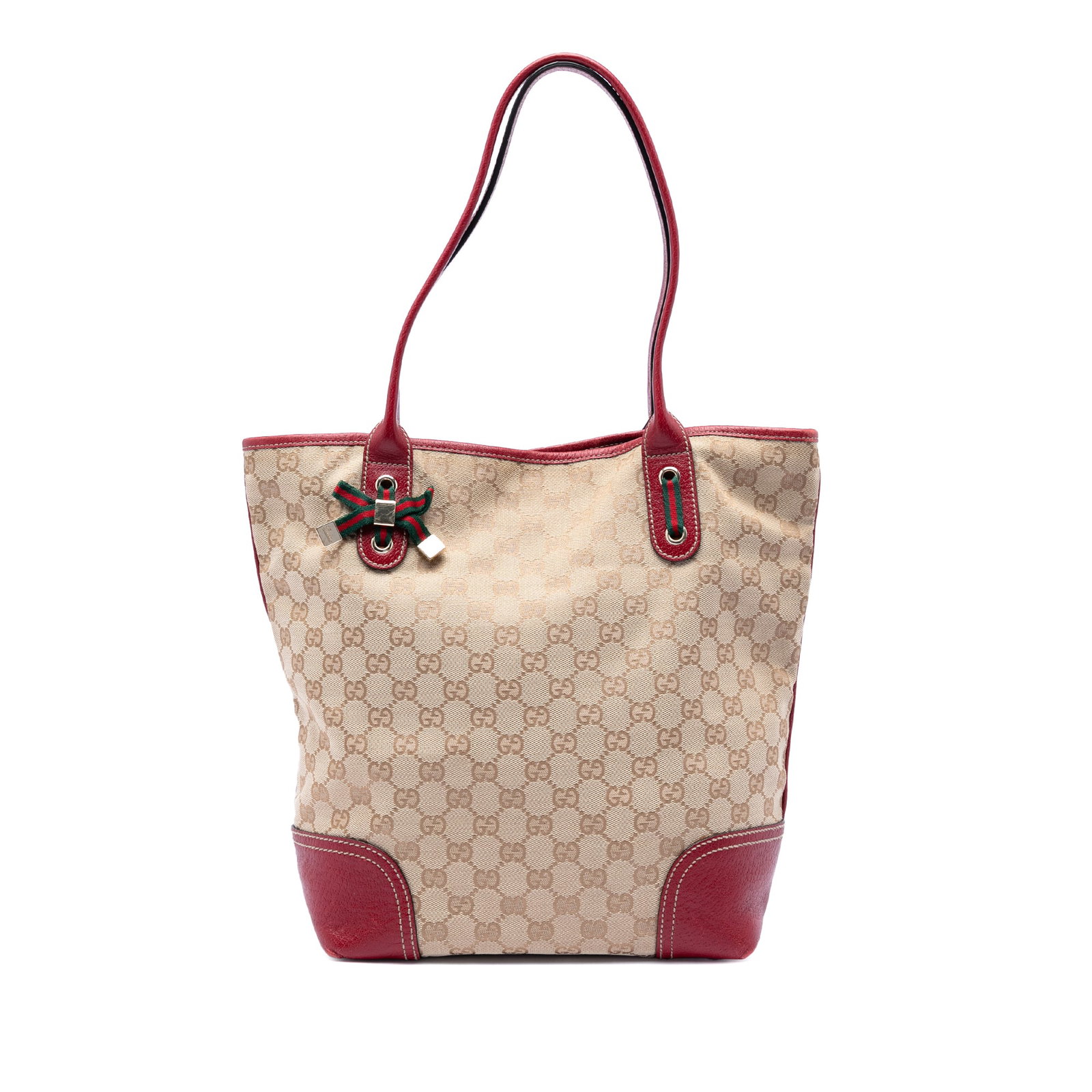 Gucci Princy GG Canvas Tote Bag: Gucci Princy GG Canvas Tote Bag This Gucci GG Canvas Princy Tote features a beige canvas body with leather trim, rolled leather handles, a top magnetic snap button closure, and interior zip and slip p