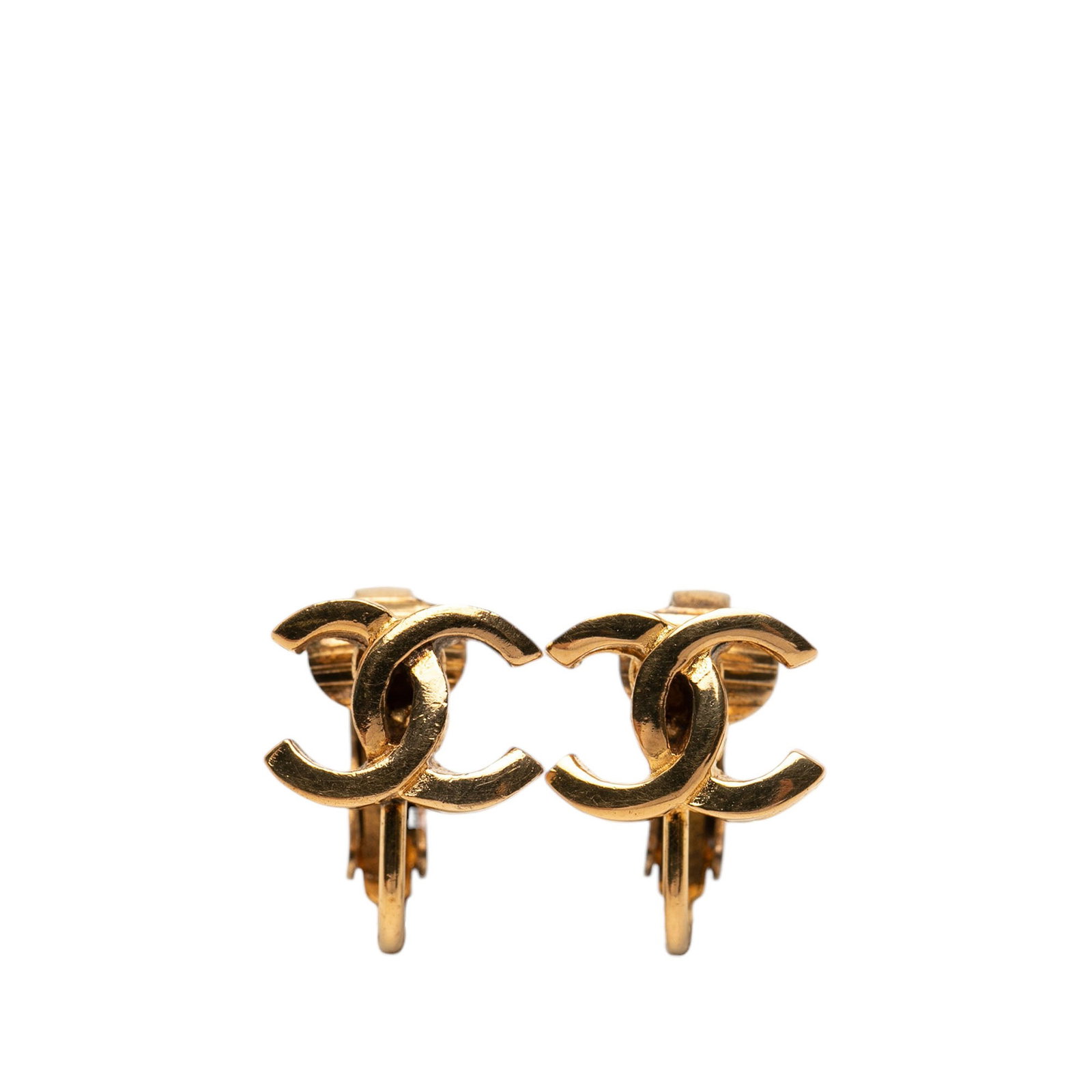 Chanel CC Clip On Earrings Gold Plated Metal: Chanel CC Clip On Earrings Gold Plated Metal Chanel CC clip-on earrings in gold-plated metal. This costume jewelry pair is made in France and features the iconic CC motif with clip-on closures. Condit