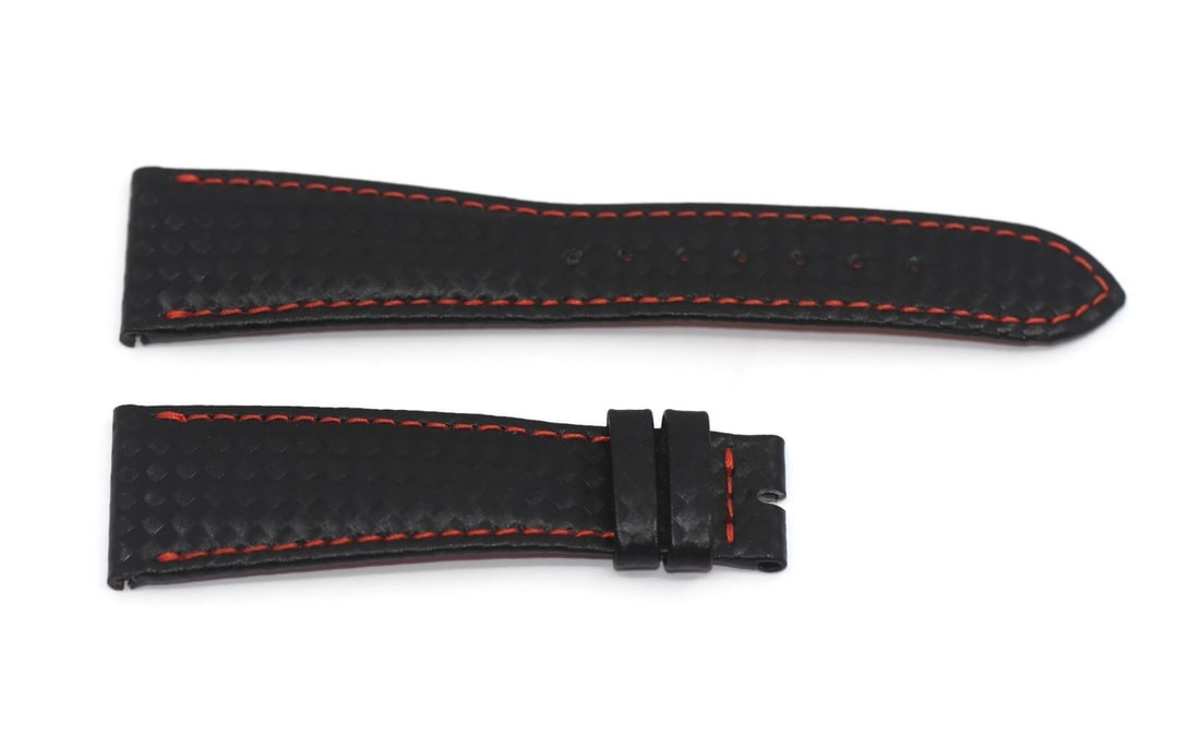Black Leather 22mm Wristwatch Band by Patek Philippe: Black Leather 22mm Wristwatch Band by Patek Philippe This is a pre-owned Patek Philippe black leather wristwatch strap. The band is crafted from genuine leather and features a classic black color. It 