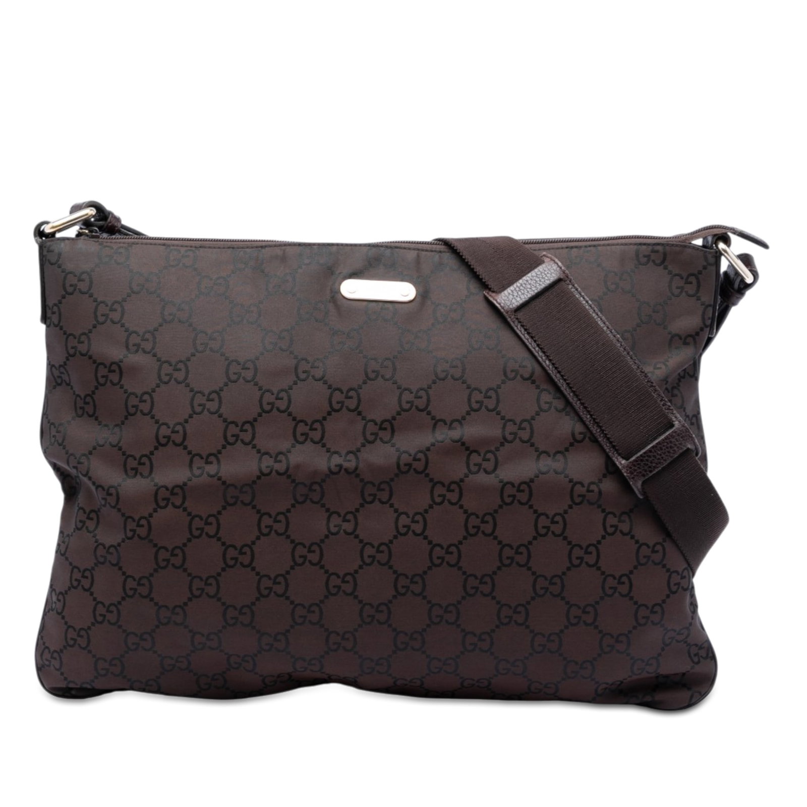 Gucci GG Nylon Crossbody Bag Brown Fabric Adjustable Strap: Gucci GG Nylon Crossbody Bag Brown Fabric Adjustable Strap Gucci GG Nylon Crossbody bag crafted with a nylon body and an adjustable flat canvas strap. The design features a top zip closure and an inte