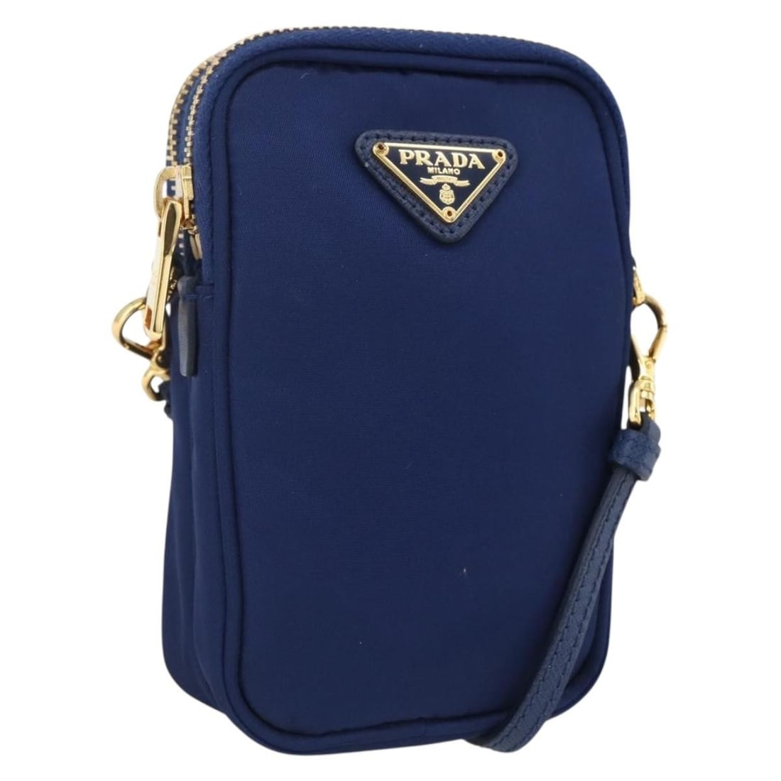 PRADA Nylon Shoulder Bag in Blue with Gold Tone Hardware: PRADA Nylon Shoulder Bag in Blue with Gold Tone Hardware Compact Prada shoulder bag in blue nylon with gold-tone detailing. Made in Italy, this women's bag has a slim profile and an adjustable shoulde