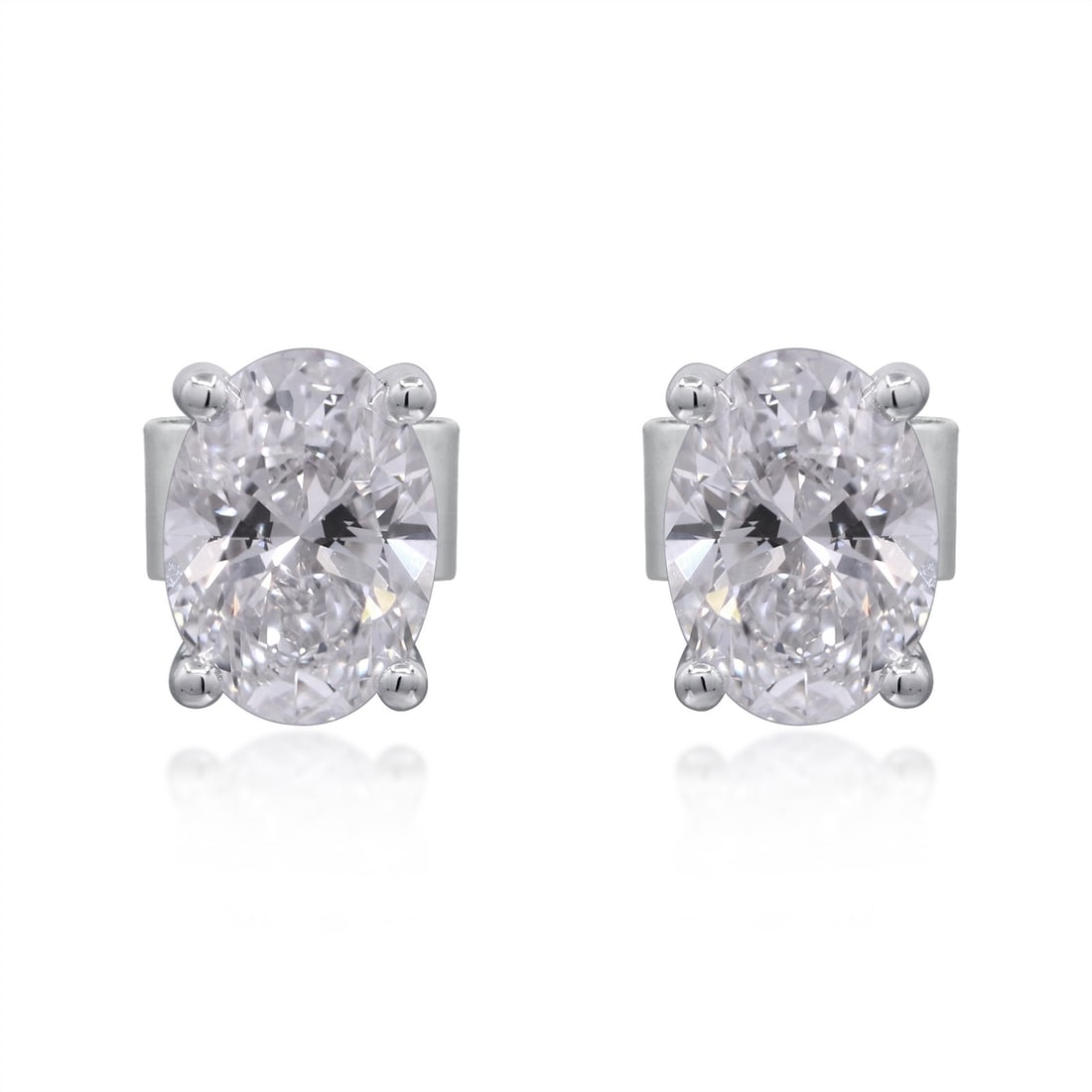 Unbranded 14K White Gold Oval Lab Grown Diamond Earrings 2.04 ctw: Unbranded 14K White Gold Oval Lab Grown Diamond Earrings 2.04 ctw Pre-owned women's earrings featuring oval lab-grown diamonds in white gold. This pair offers a clean white color profile and a classic