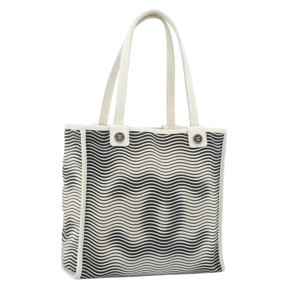 CHANEL Canvas Tote Handbag Black White Silver CC: CHANEL Canvas Tote Handbag Black White Silver CC Authentic CHANEL tote bag in black, white, and silver canvas. This women's tote was made in Italy and is offered with only the item shown, with no box 
