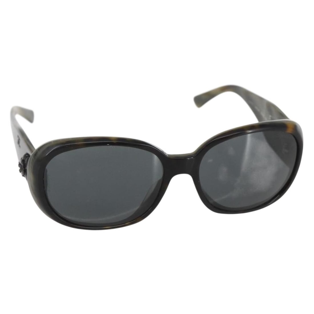 Gray Camelia 5113-A Sunglasses by CHANEL with Case Plastic Frame: Gray Camelia 5113-A Sunglasses by CHANEL with Case Plastic Frame These CHANEL Camelia sunglasses feature a gray plastic frame and are part of the 5113-A product line. Made in Italy, they include a mat