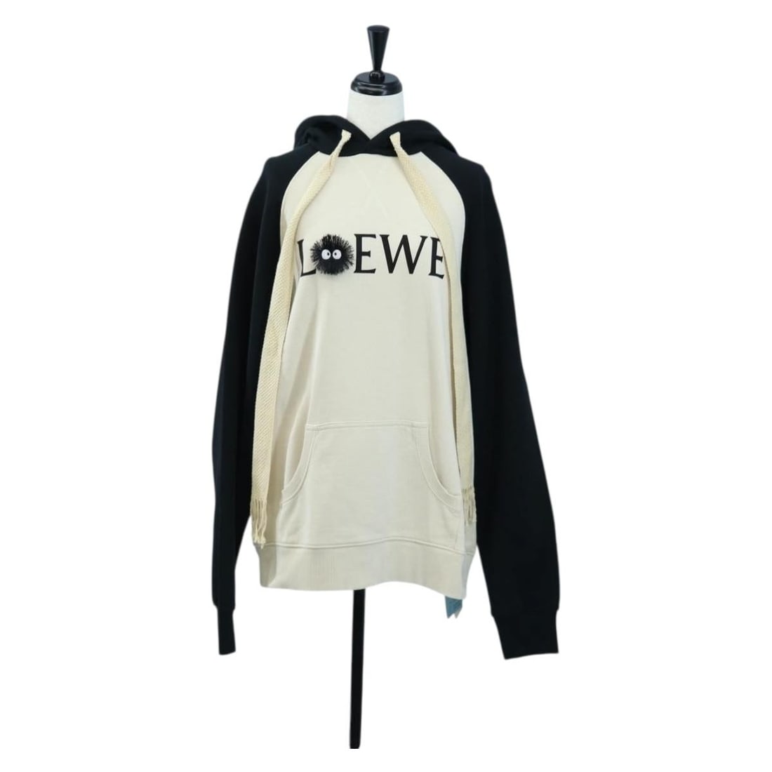 LOEWE Studio Ghibli Totoro Soot Sprite Cotton Jacket Beige Black: LOEWE Studio Ghibli Totoro Soot Sprite Cotton Jacket Beige Black LOEWE x Studio Ghibli My Neighbor Totoro Soot Sprite hoodie in beige and black cotton. Made in Portugal, this women's piece is presente