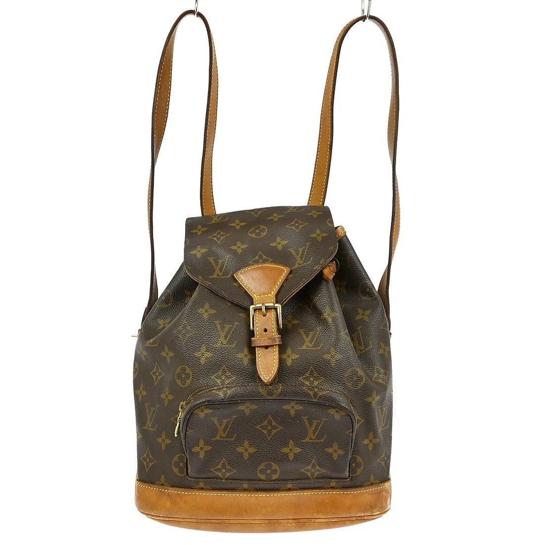Louis Vuitton Montsouris MM Monogram Canvas Backpack M51136: Louis Vuitton Montsouris MM Monogram Canvas Backpack M51136 Vintage Louis Vuitton Montsouris MM backpack in brown Monogram canvas with leather trim. This women's medium backpack features a flap buckle