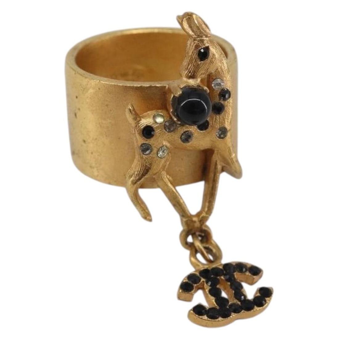 CHANEL Bambi Motif Gold Tone Black Metal Ring Size 8: CHANEL Bambi Motif Gold Tone Black Metal Ring Size 8 CHANEL Bambi motif ring in gold tone and black metal. This women's ring was made in France and features the CC design. Includes only the ring shown