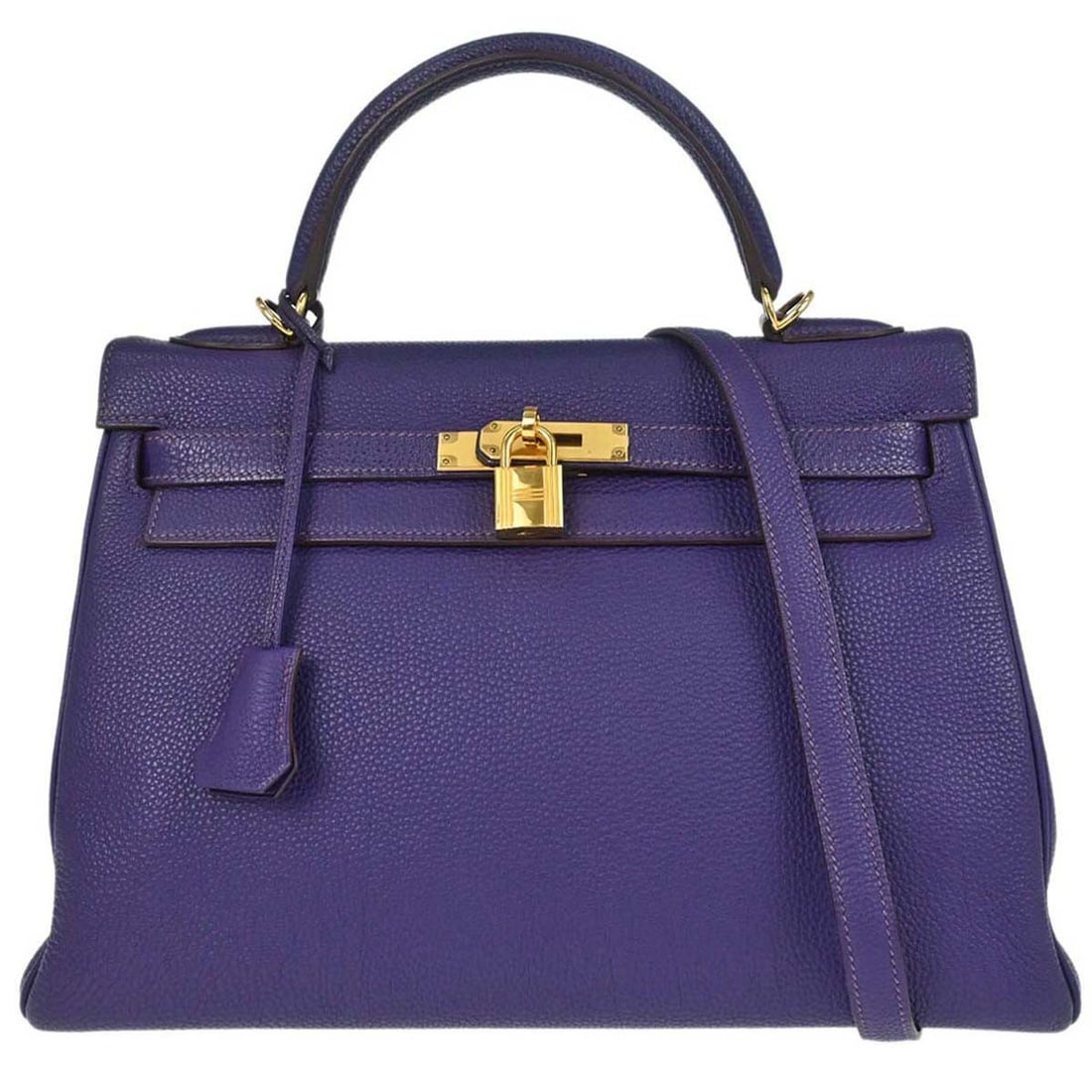 Hermes Kelly 32 Retourne Togo Iris Top Handle Satchel: Hermes Kelly 32 Retourne Togo Iris Top Handle Satchel Hermes Kelly 32 Retourne 2-way handbag in Iris Togo leather with silver-tone hardware. This structured satchel features a turn-lock flap closure, 