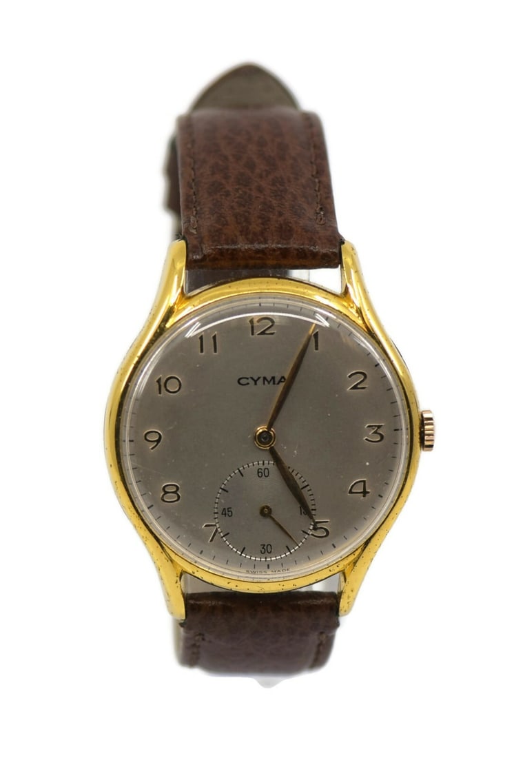 Cyma Two Tone Gold Plated Stainless Steel Watch 37mm: Cyma Two Tone Gold Plated Stainless Steel Watch 37mm This Cyma Two Tone Stainless Steel Watch features a striking design with a gold plated stainless steel case and a classic leather band. The watch i