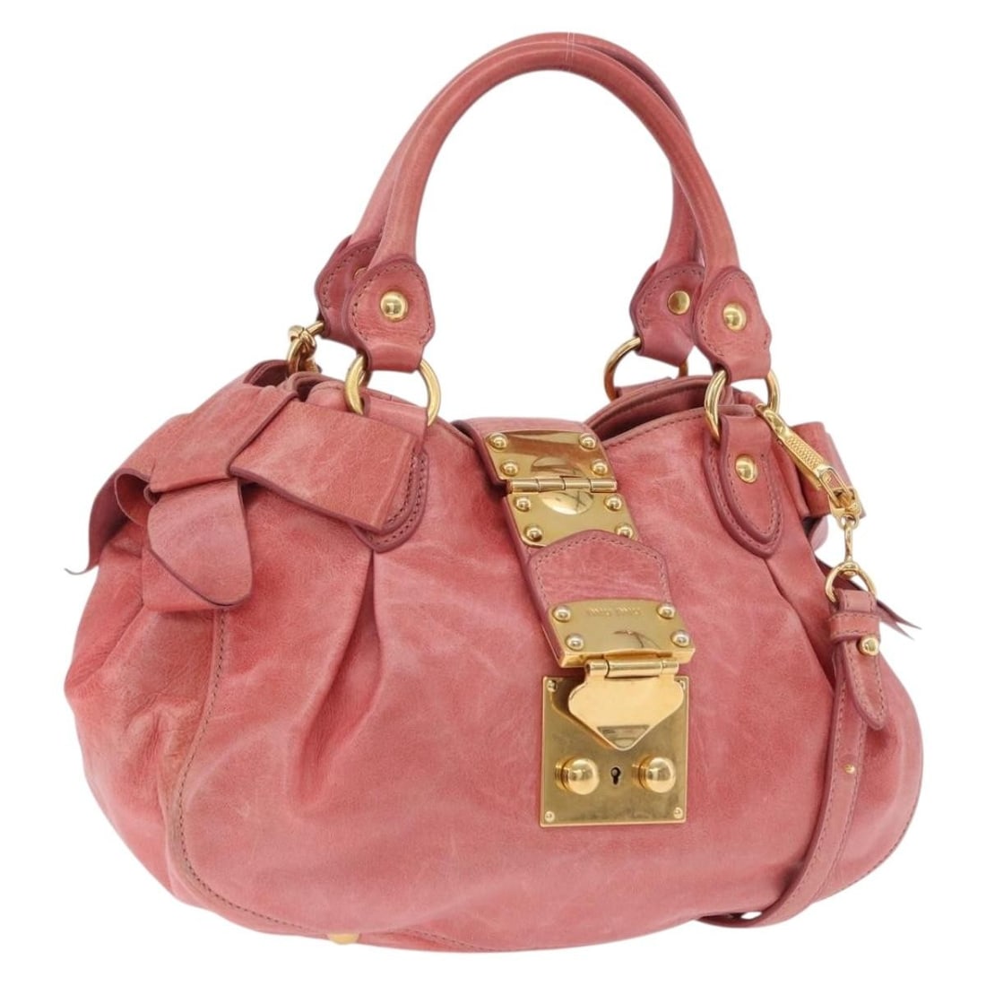 Miu Miu Pink Leather 2 Way Handbag with Strap Dust Bag: Miu Miu Pink Leather 2 Way Handbag with Strap Dust Bag Miu Miu 2-way handbag in pink leather with gold-tone accents. Made in Italy, this women's bag includes a dust bag and shoulder strap. Condition i