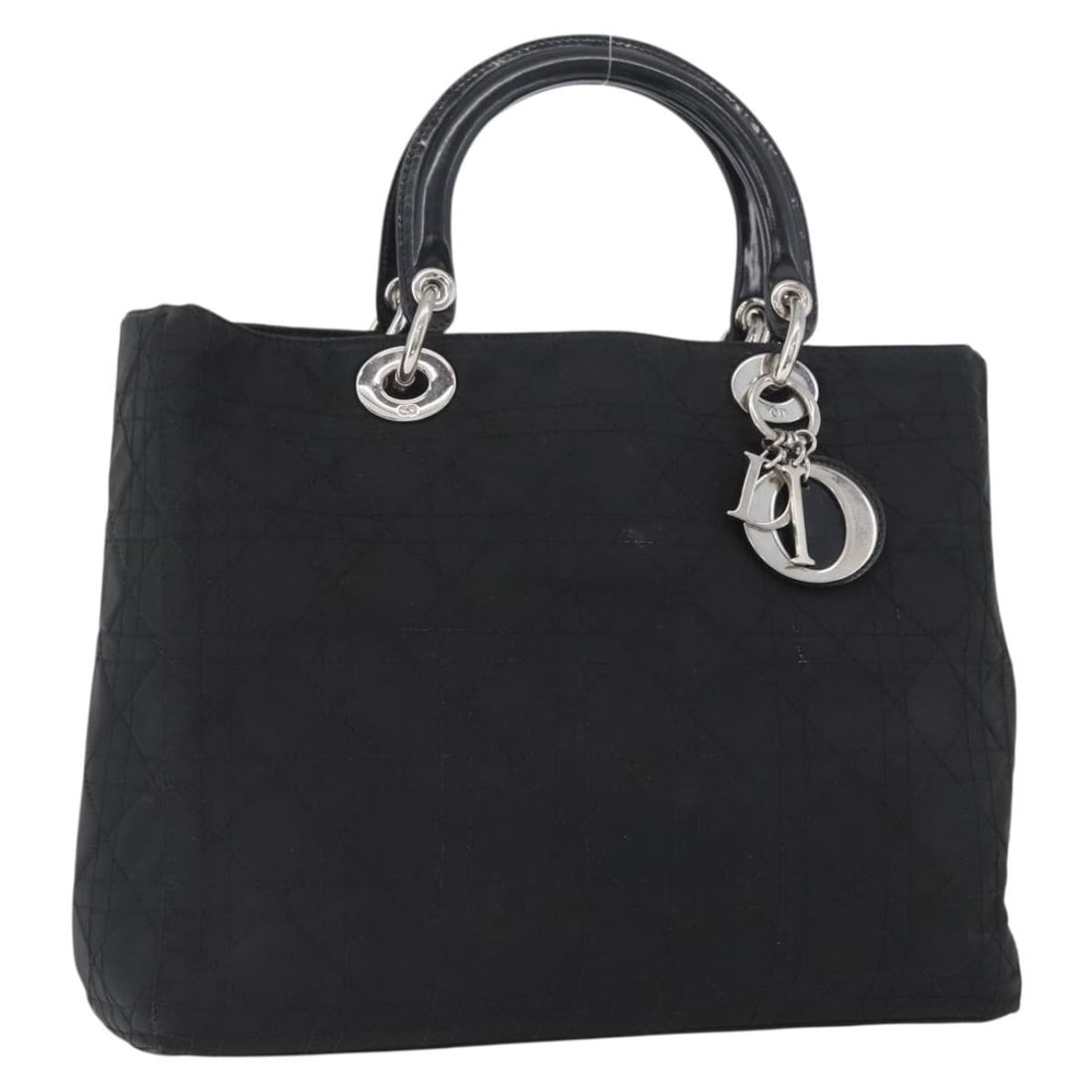 Christian Dior Cannage Nylon Handbag Black Silver Charm: Christian Dior Cannage Nylon Handbag Black Silver Charm Christian Dior Cannage handbag in black nylon with silver-tone accents. Made in Italy, this women's handbag includes a charm accessory. Conditio