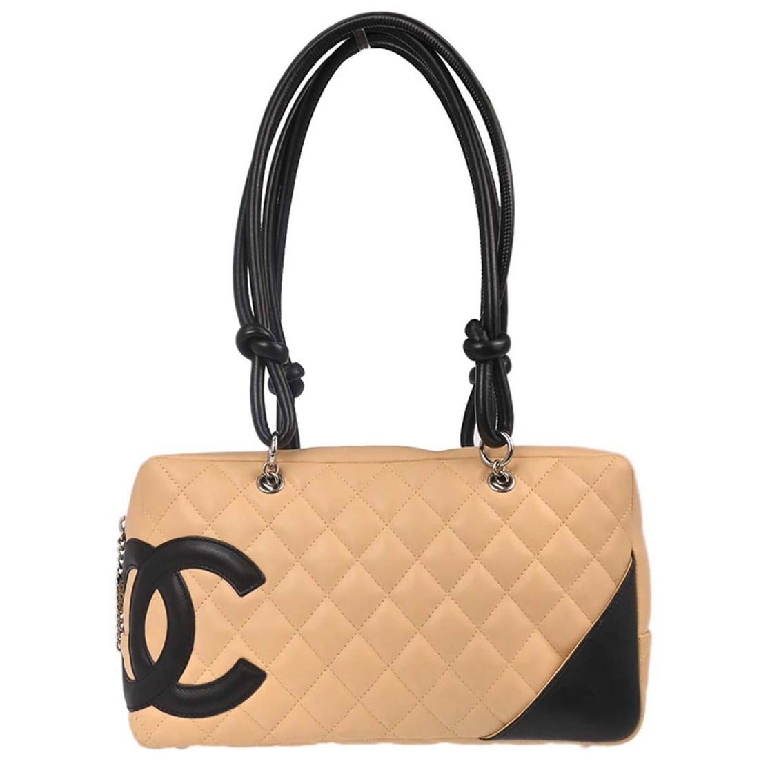 CHANEL Cambon Ligne beige calfskin top handle handbag: CHANEL Cambon Ligne beige calfskin top handle handbag Chanel Cambon Ligne Bowling Bag in beige calfskin leather with black double handles, a quilted matelasse finish, and silver-tone hardware. This me