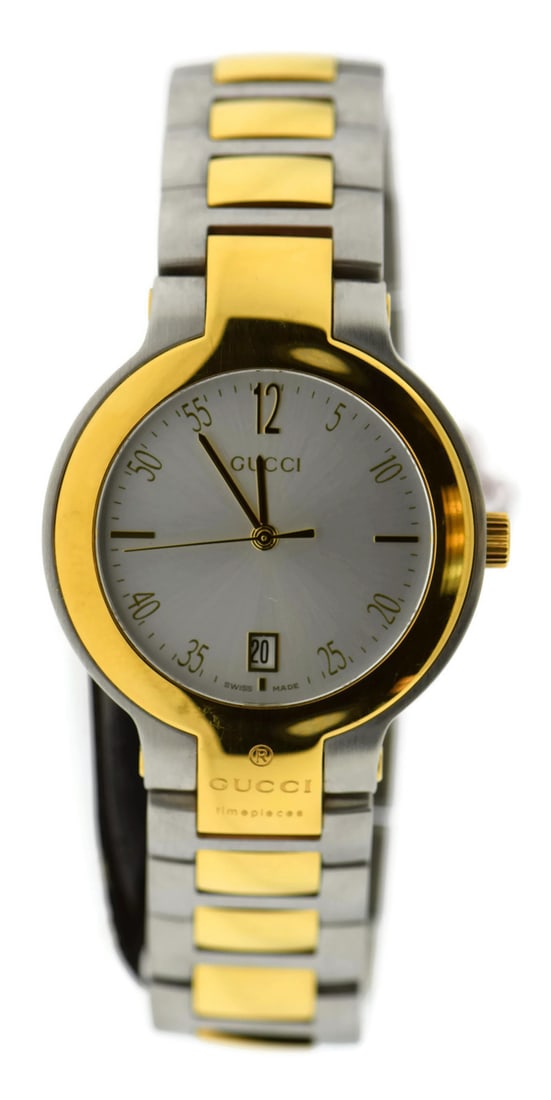 Gucci YA089304 Two Tone Stainless Steel Quartz Watch: Gucci YA089304 Two Tone Stainless Steel Quartz Watch This exquisite Gucci two-tone stainless steel watch, model YA089304, features a classic design perfect for any occasion. With a reliable quartz mov