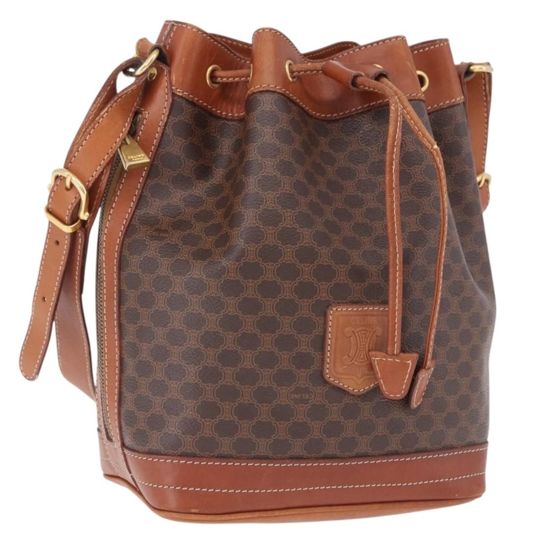 CELINE Macadam Brown PVC Leather Shoulder Bag Italy: CELINE Macadam Brown PVC Leather Shoulder Bag Italy Celine Macadam canvas shoulder bag in brown with gold-tone accents, crafted with PVC and leather. Made in Italy, this women's shoulder bag includes 