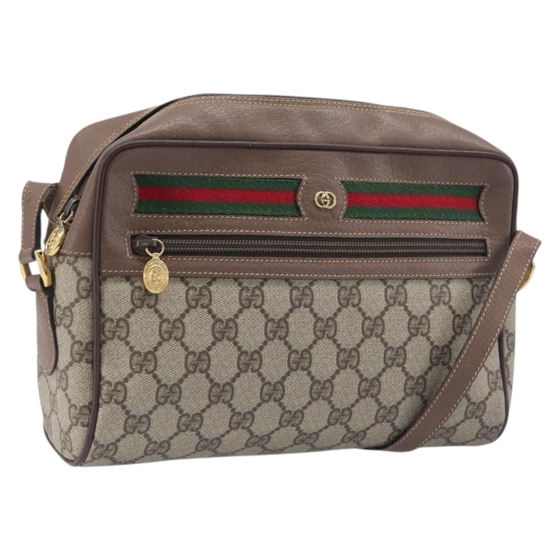 Gucci 001 113 6472 GG Supreme PVC Shoulder Bag Beige Gold: Gucci 001 113 6472 GG Supreme PVC Shoulder Bag Beige Gold Vintage Gucci shoulder bag from the GG Supreme Web Sherry Line in beige and gold. Made in Italy from PVC leather and GG canvas, this women's b
