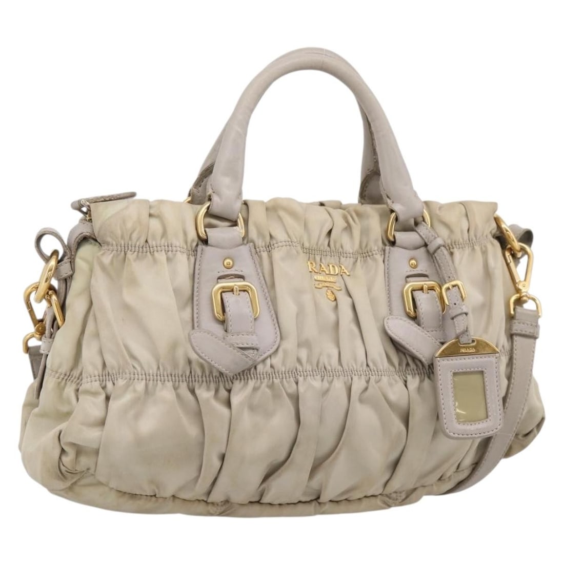 PRADA nylon 2way handbag beige gold with shoulder strap: PRADA nylon 2way handbag beige gold with shoulder strap Prada gathered 2-way handbag in beige and gold nylon with dual carry options via the top handle and detachable shoulder strap. Includes the name