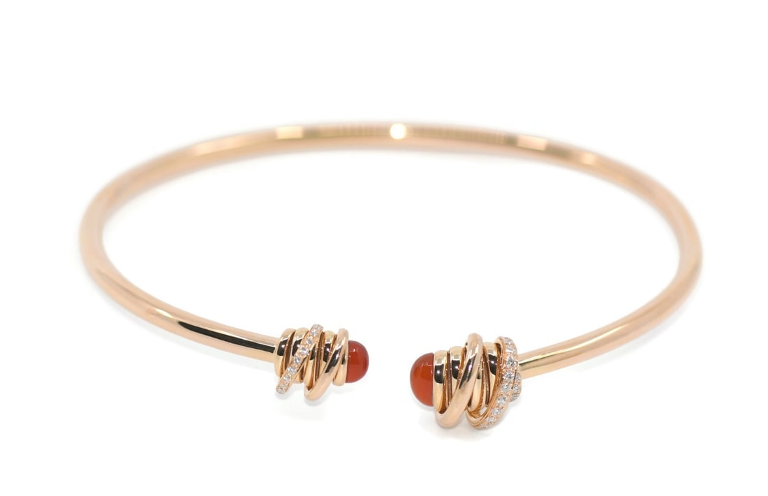 De Grisogono 18K Rose Gold Diamond Bangle Bracelet Authentic: De Grisogono 18K Rose Gold Diamond Bangle Bracelet Authentic This exquisite bracelet from de Grisogono features a stunning design crafted from 18K rose gold, known for its warm pink hue. The bangle-st