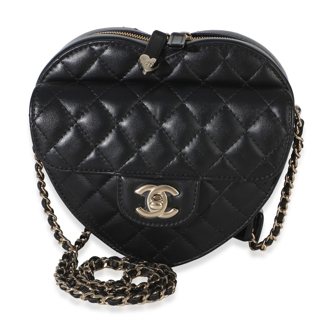 Chanel CC In Love Heart crossbody bag black quilted lambskin: Chanel CC In Love Heart crossbody bag black quilted lambskin Chanel CC In Love Heart Bag in black quilted lambskin with a zip-around closure and gold-tone hardware. This pre-owned crossbody design fea