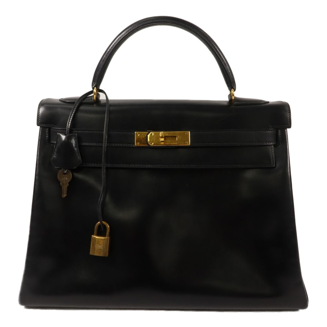 Hermes Kelly 32 Box Calf 2 Way Shoulder Bag Noir GHW: Hermes Kelly 32 Box Calf 2 Way Shoulder Bag Noir GHW Hermes Kelly 32 2-way shoulder bag in Noir box calf leather with gold-tone hardware. This women's bag is made in France and features a turn-lock cl