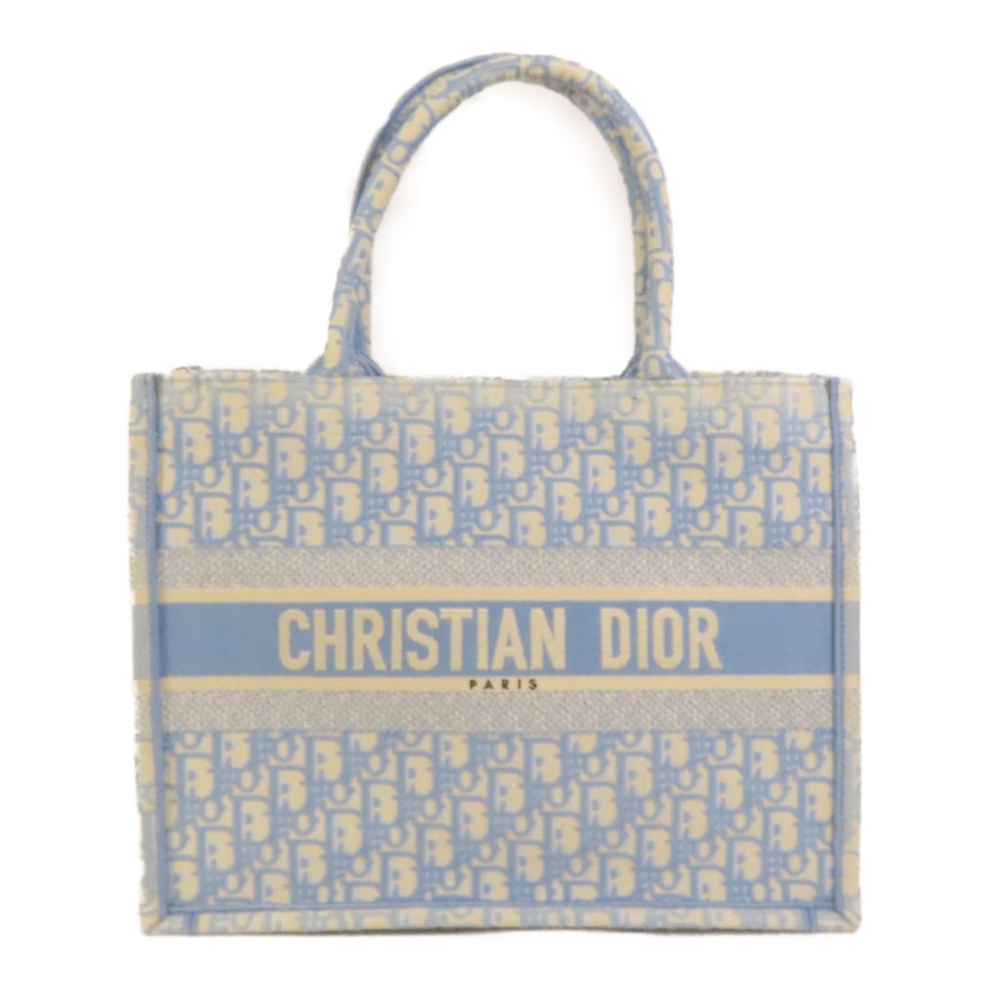 Dior CD Book Tote Medium Blue Canvas Handbag: Dior CD Book Tote Medium Blue Canvas Handbag A Christian Dior Book Tote medium handbag in blue and light blue canvas. This women's tote bag is made in France and comes in regular size. The item is in 