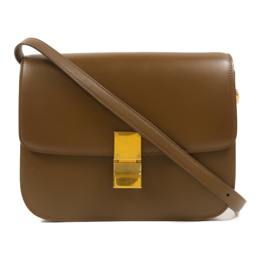 CELINE Classic Box Medium Brown Calfskin Shoulder Bag GHW: CELINE Classic Box Medium Brown Calfskin Shoulder Bag GHW Celine Classic Box Medium shoulder bag in brown calfskin leather with a structured silhouette and flap-front design. The interior includes two