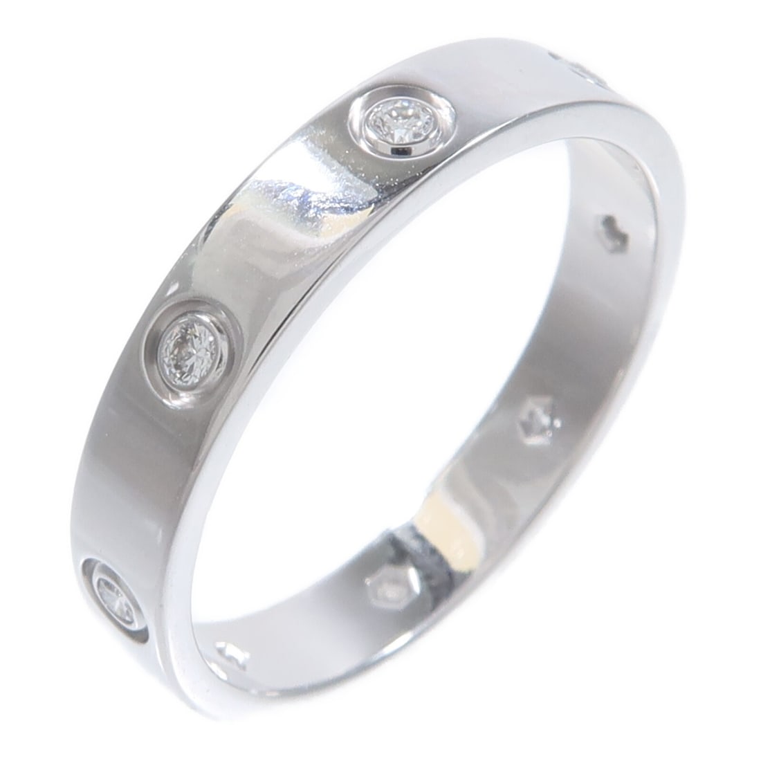 Cartier Mini Love Ring 18K White Gold 8 Diamond Size 62: Cartier Mini Love Ring 18K White Gold 8 Diamond Size 62 Cartier Mini Love ring crafted in 18K white gold and set with 8 diamonds. This unisex ring is made in France and features an engraved Cartier si