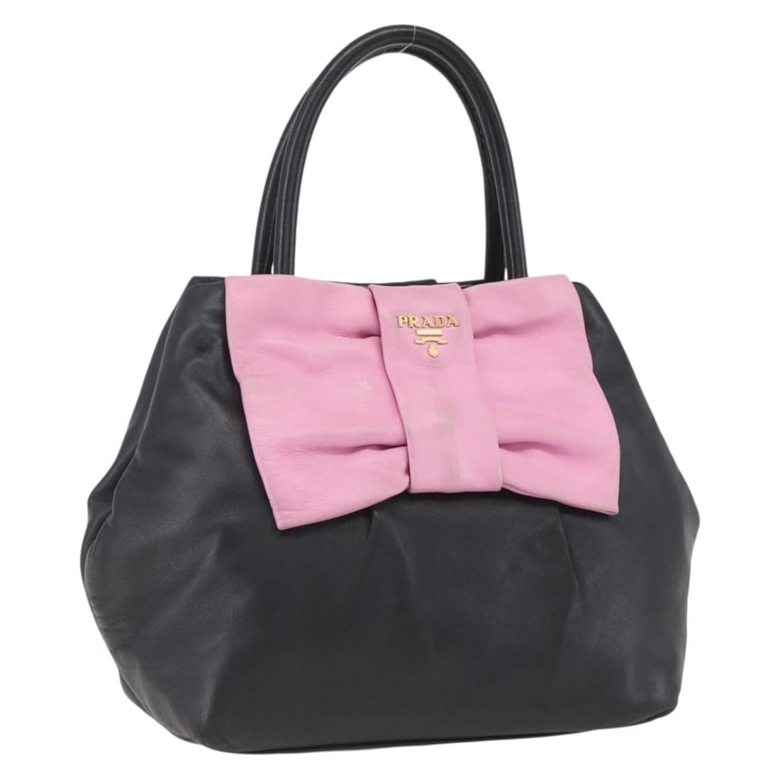 Prada Black and Gold Leather Handbag Made in Italy: Prada Black and Gold Leather Handbag Made in Italy This PRADA handbag is crafted from black leather with gold accents. Made in Italy, it features a structured design with a top handle. The bag shows s