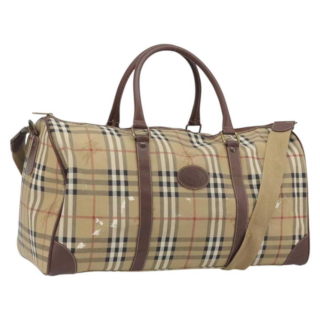 Burberrys Nova Check 2way Boston Bag in Beige PVC Leather: Burberrys Nova Check 2way Boston Bag in Beige PVC Leather Burberrys 2-way Boston bag in beige and gold PVC leather with dual carry options. The bag includes a shoulder strap and was made in Italy. Con