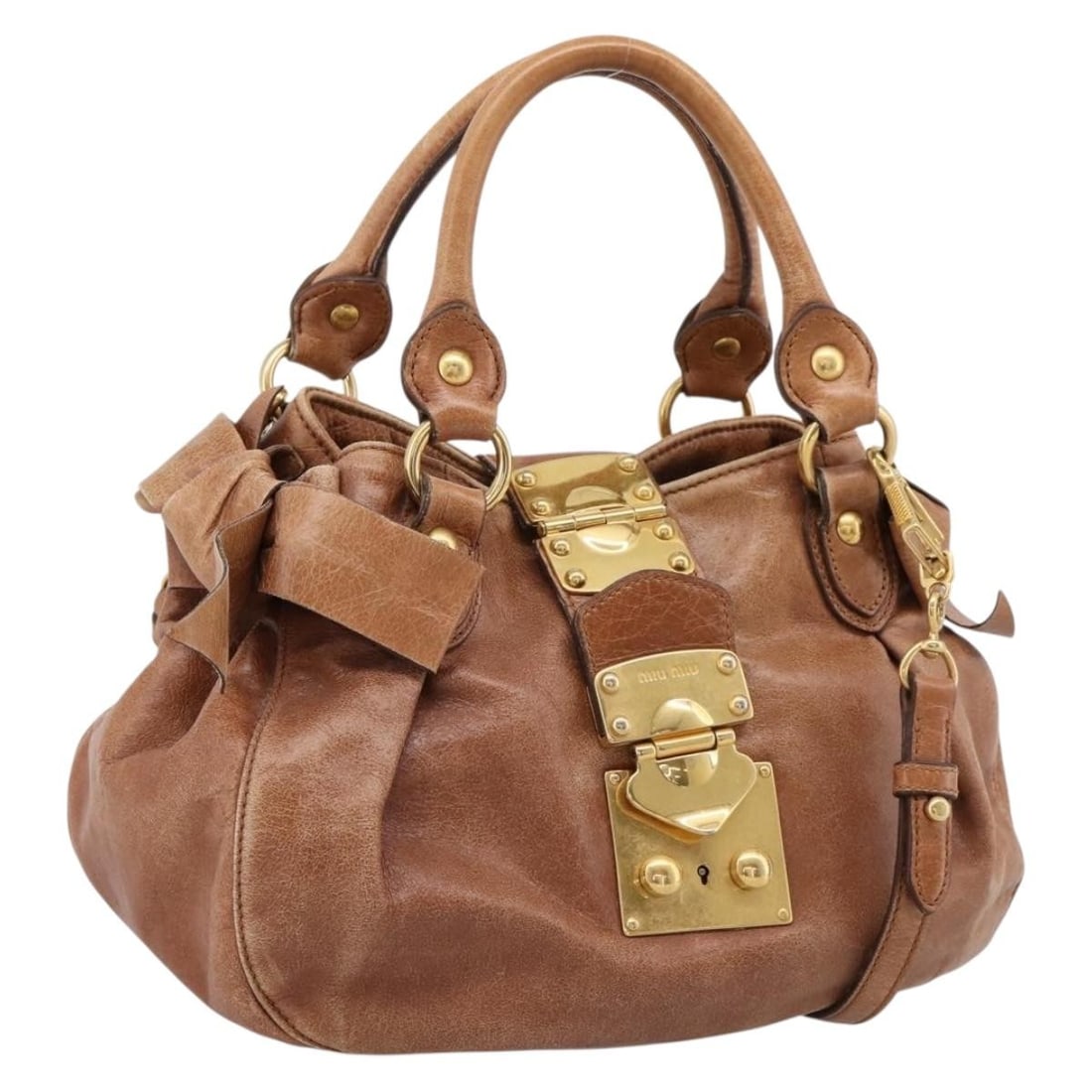 Miu Miu Leather 2way Handbag Brown with Shoulder Strap: Miu Miu Leather 2way Handbag Brown with Shoulder Strap Miu Miu 2-way handbag in brown leather with gold-tone accents. Designed for women, this bag includes a shoulder strap for hand or shoulder carry.