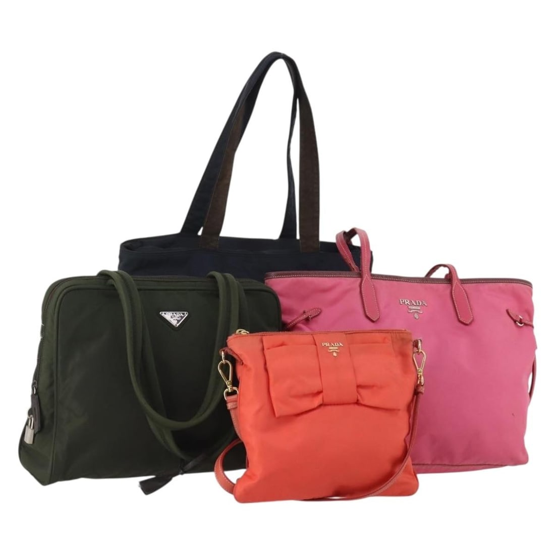 PRADA Nylon Shoulder Bag 4 Piece Bundle Navy Pink: PRADA Nylon Shoulder Bag 4 Piece Bundle Navy Pink Prada women's shoulder bag in navy and pink nylon, made in Italy. This listing includes only the bag shown. It is a heavily used piece with visible we