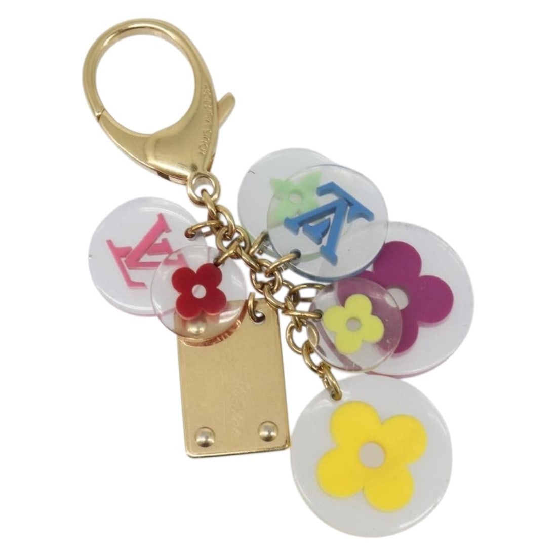 Louis Vuitton M60046 Porte Cles Fleur Metal Charm Gold Clear: Louis Vuitton M60046 Porte Cles Fleur Metal Charm Gold Clear Louis Vuitton Porte Cles Fleur charm in gold-tone metal with clear accents. This women's bag charm features the M60046 design and was made 