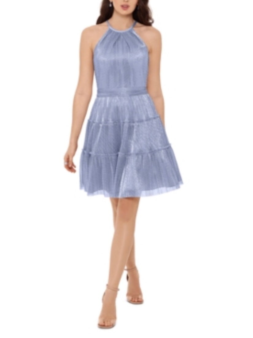 Xscape Fit and Flare Short Dress Womens 12 Silver Polyester: Xscape Fit and Flare Short Dress Womens 12 Silver Polyester Pre-owned Xscape fit and flare dress with a metallic silver and purple look and a tiered skirt. Designed for women in a regular size 12, thi