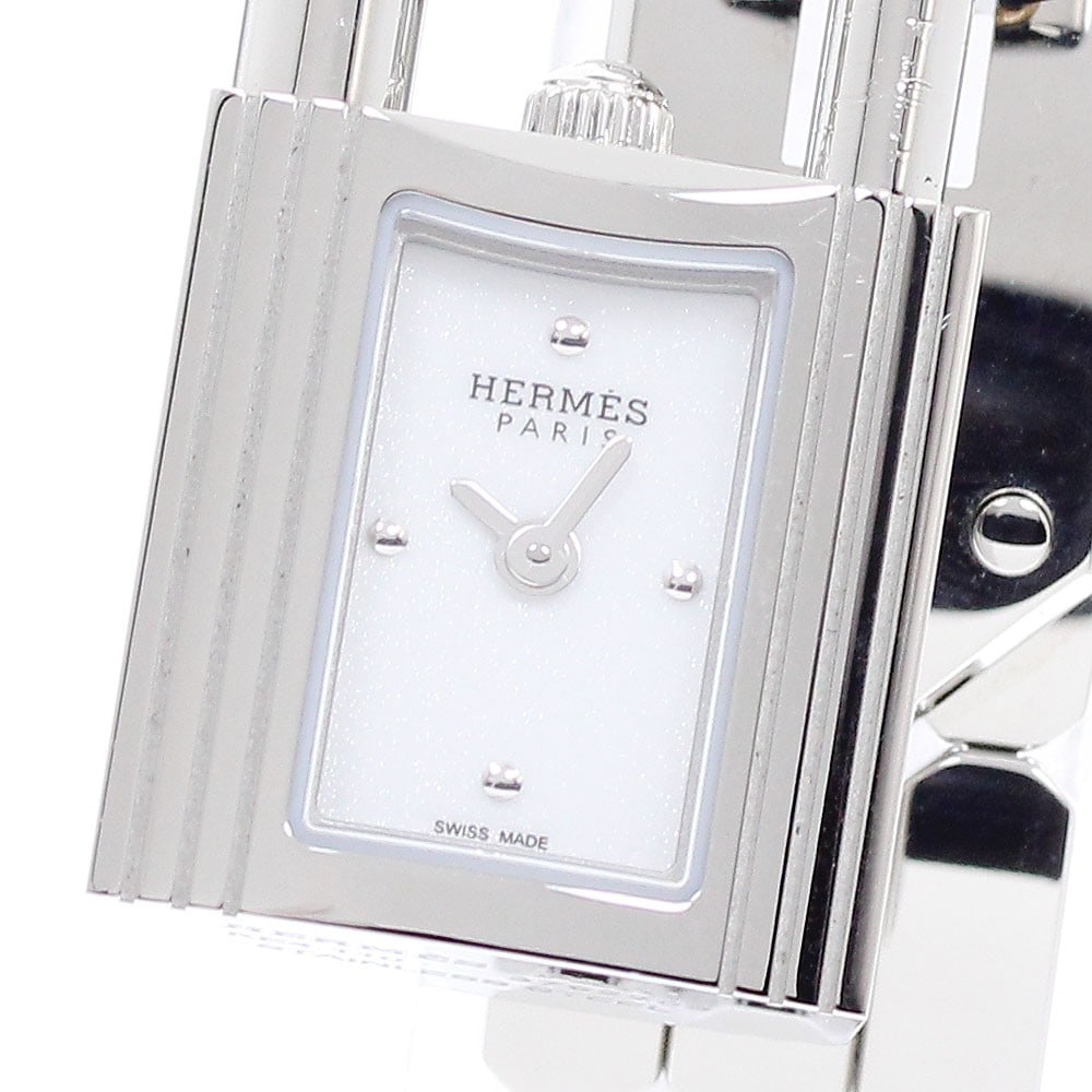 Hermes Kelly Watch KE4.110 Womens Quartz Wristwatch Steel White Dial: Hermes Kelly Watch KE4.110 Womens Quartz Wristwatch Steel White Dial Hermes Kelly Watch quartz wristwatch for women with a white dial and stainless steel case and bracelet. This Swiss-made watch inclu
