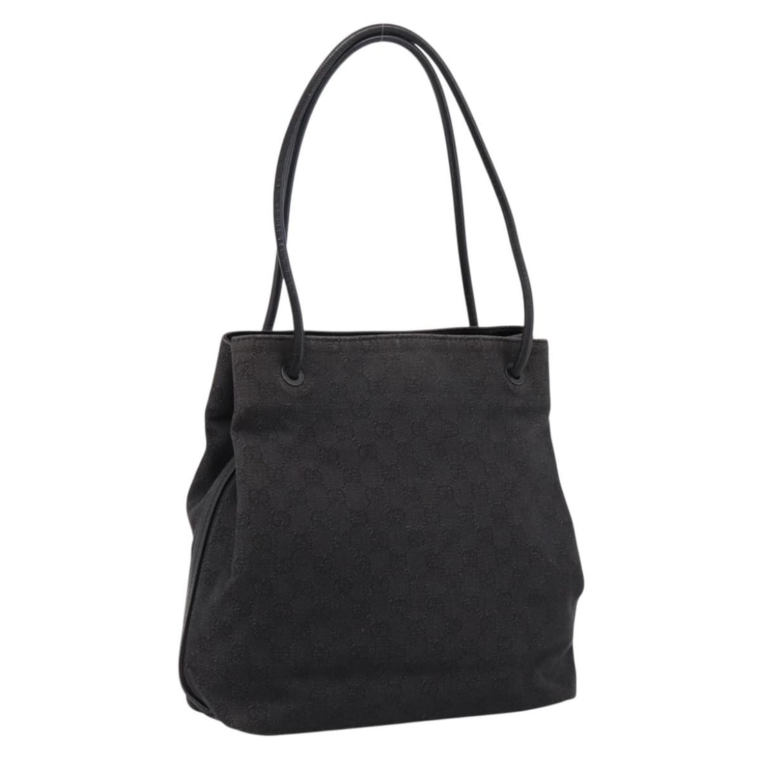 Gucci 101341 GG Canvas Tote Handbag in Black: Gucci 101341 GG Canvas Tote Handbag in Black Authentic Gucci tote bag in black GG canvas with a classic structured silhouette and shoulder-length handles. Made in Italy, this women's bag shows heavy s