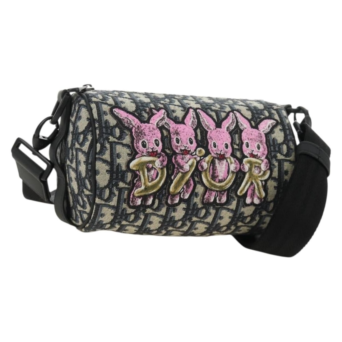Christian Dior Trotter Canvas Navy Shoulder Messenger Bag: Christian Dior Trotter Canvas Navy Shoulder Messenger Bag Christian Dior Trotter Canvas Roller Messenger Shoulder Bag in navy, made in Italy. This women's shoulder bag features Trotter canvas exterior