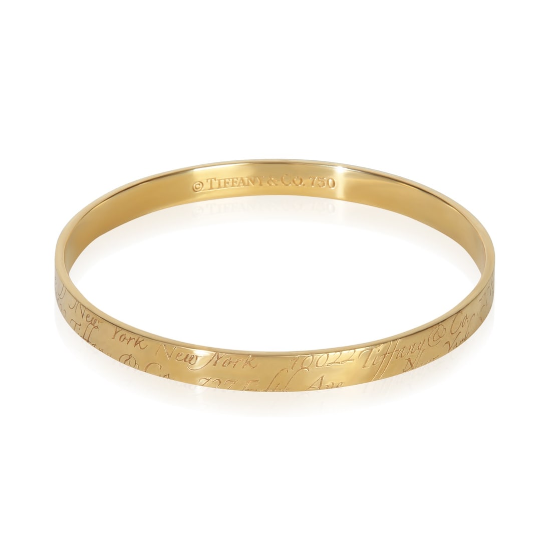 Tiffany & Co. Notes Bangle Bracelet 18k Yellow Gold: Tiffany & Co. Notes Bangle Bracelet 18k Yellow Gold Tiffany & Co. Notes Bangle bracelet crafted in 18k yellow gold. This women's bracelet features a clean, stone-free design and a slip-on style with n