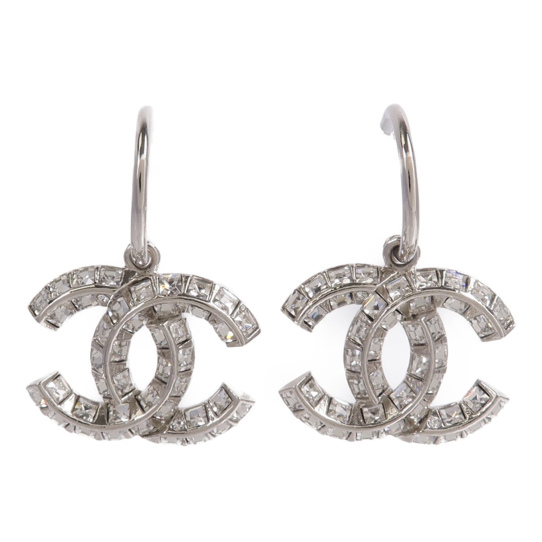 CHANEL CC Pierced Earrings Silver Tone Metal Clear: CHANEL CC Pierced Earrings Silver Tone Metal Clear CHANEL CC pierced earrings in silver-tone metal with a clear and silver color combination. Made in France and marked with date code 13 P. Accessories