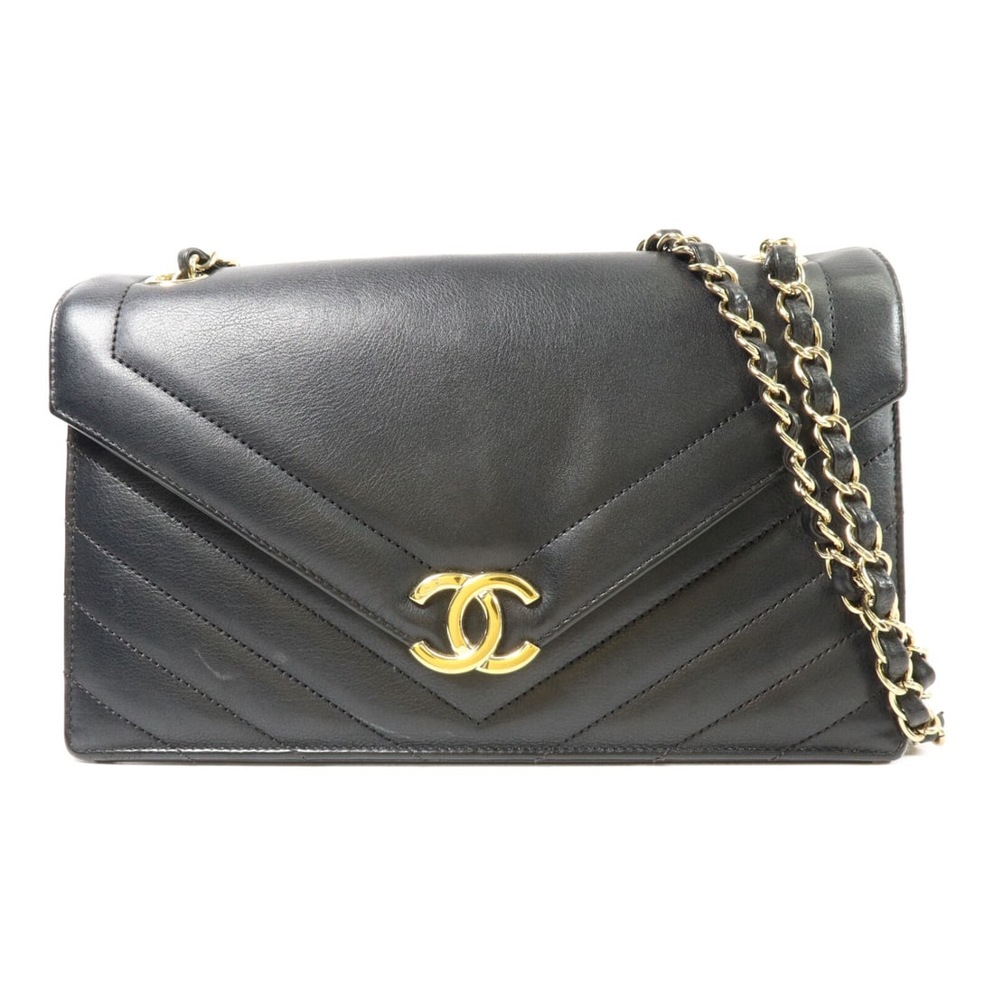 CHANEL AS0027 Large Chevron Flap Shoulder Bag Black Calfskin CC GHW: CHANEL AS0027 Large Chevron Flap Shoulder Bag Black Calfskin CC GHW Large chevron flap shoulder bag in black calfskin leather with CC detail and chain strap. This women's shoulder bag features a magne