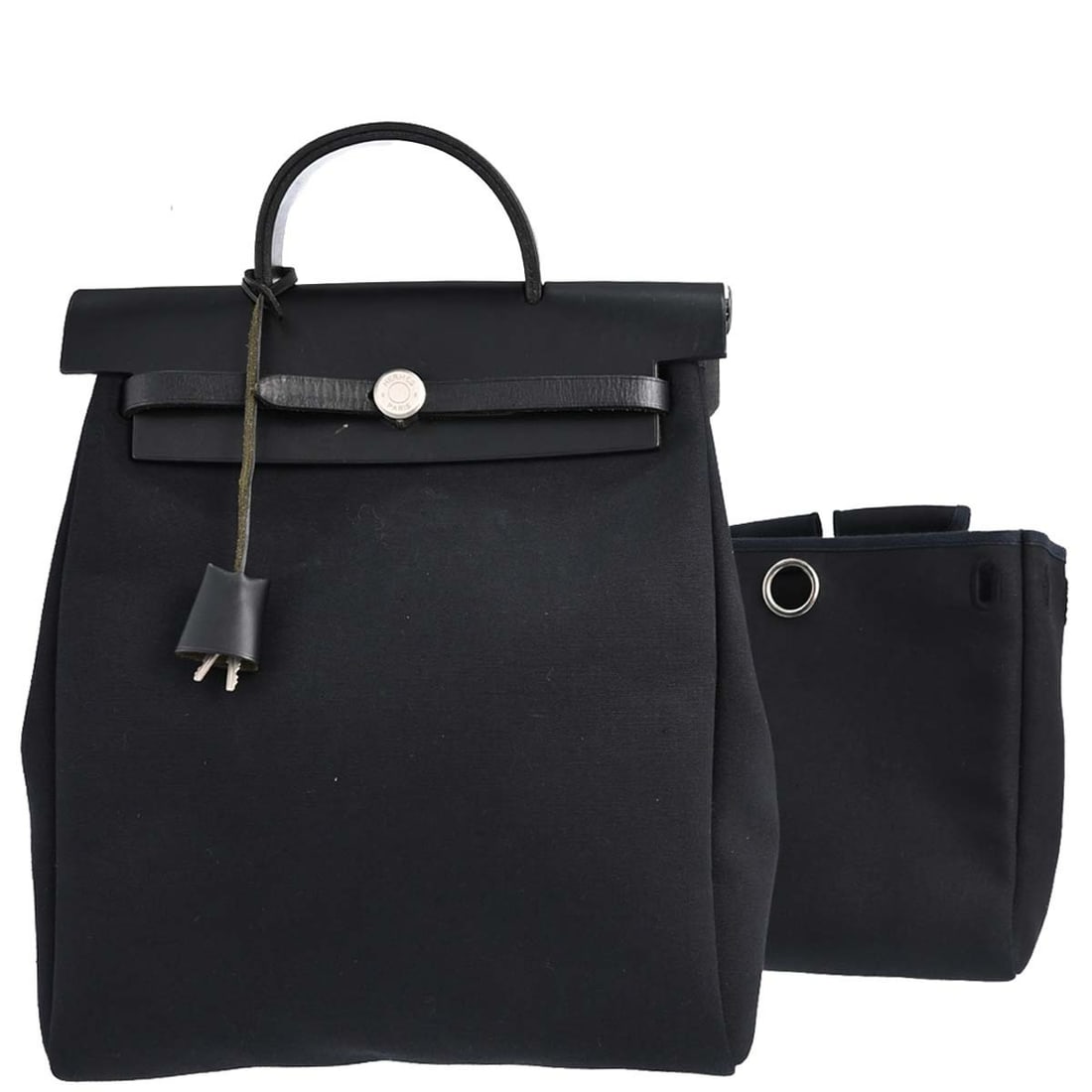 Hermes Herbag a Dos 2 in 1 Black Toile Officier Backpack: Hermes Herbag a Dos 2 in 1 Black Toile Officier Backpack Vintage Hermes Herbag a Dos 2 in 1 backpack in black toile officier and leather. This medium women's bag features a versatile design with inter