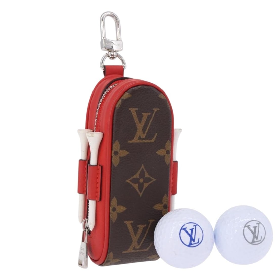 Louis Vuitton GI0297 Monogram Canvas Golf Ball Case Red: Louis Vuitton GI0297 Monogram Canvas Golf Ball Case Red Louis Vuitton GI0297 golf ball case in Monogram canvas with red accents, made in France. This heavily used piece shows slight rubbing on the sur