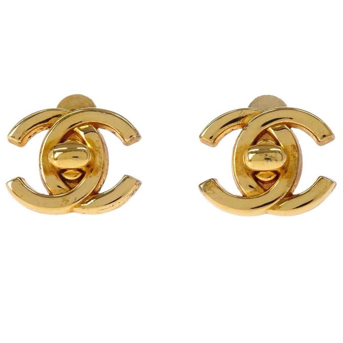 Chanel CC Turnlock Gold Tone Clip Earrings 96P: Chanel CC Turnlock Gold Tone Clip Earrings 96P Small Chanel clip-on earrings featuring the CC turnlock motif in a gold-tone finish. Made in France, this pair shows visible wear including scratches, di