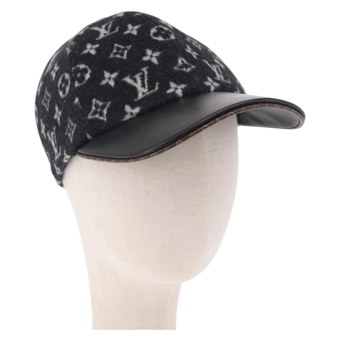 Louis Vuitton M76712 Wool Monogram Hat Size M Black: Louis Vuitton M76712 Wool Monogram Hat Size M Black Louis Vuitton women's hat in wool with a monogram and black design. Made in Italy, this carry-on style hat comes with a dust bag. Condition is excel