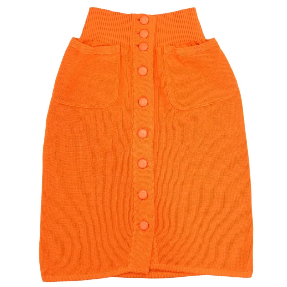 CHANEL Orange Button Front Knee Length Skirt IT 36: CHANEL Orange Button Front Knee Length Skirt IT 36 Vintage Chanel button-up knee-length skirt in orange with logo accents and two exterior pockets. Made in Italy, this women's regular-fit skirt is sui