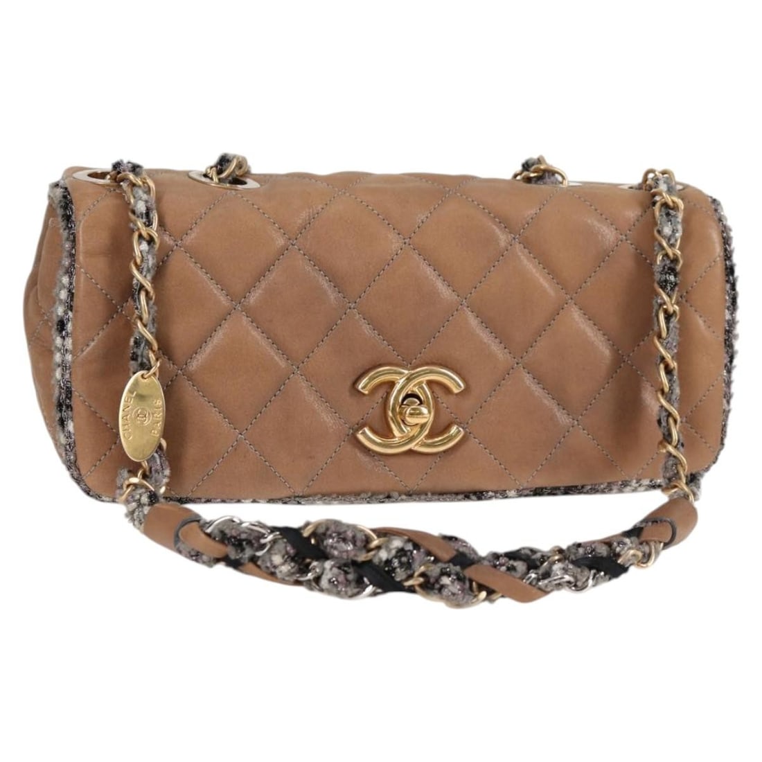 CHANEL CC Matelasse Beige Coated Canvas Shoulder Bag: CHANEL CC Matelasse Beige Coated Canvas Shoulder Bag Chanel Matelasse chain shoulder bag in beige coated canvas. This women's shoulder bag includes the guarantee card and was made in Italy. Condition 